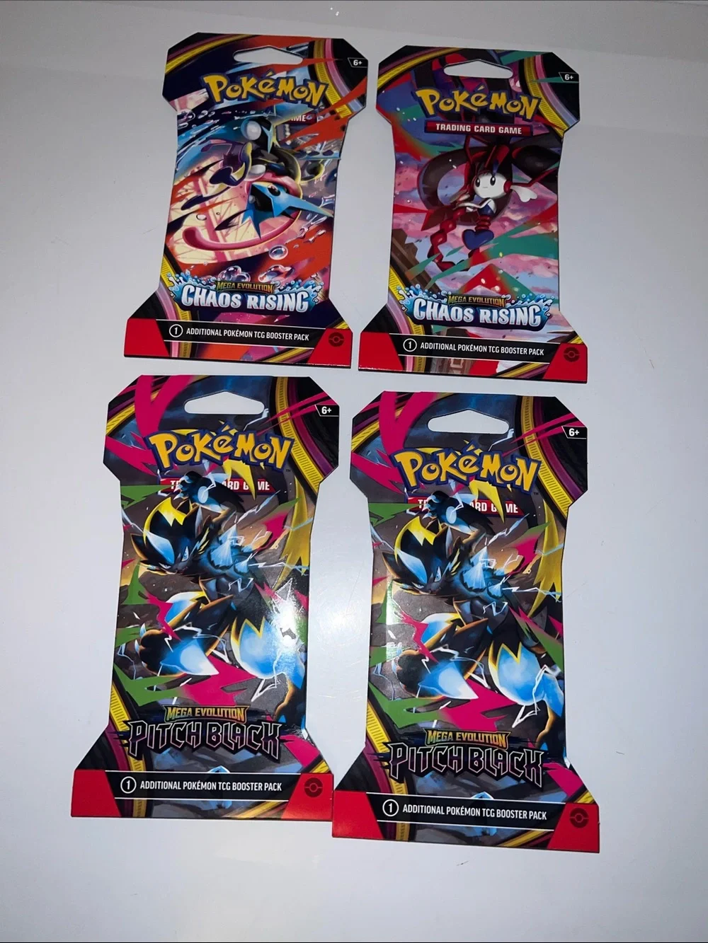 NWT 4pc Chaos Rising & Pitch Black Pokemon TCG Booster Packs
